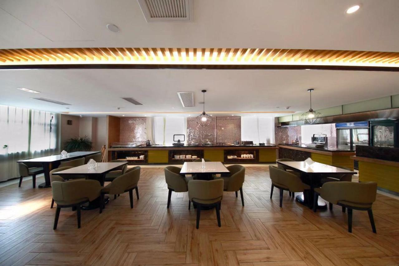 锦江都城酒店海南省政府日月广场免税店 Haikou  Extérieur photo
