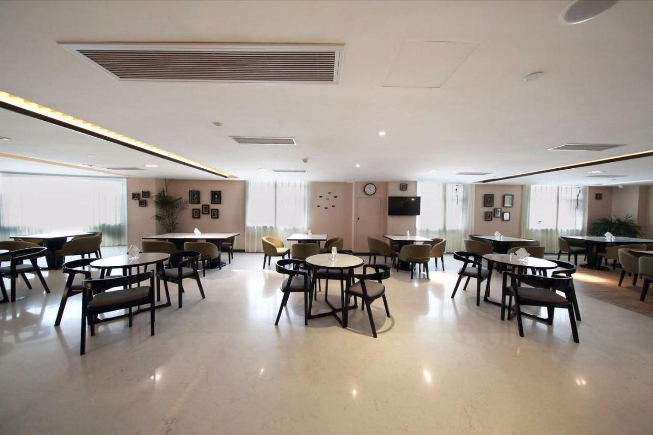 锦江都城酒店海南省政府日月广场免税店 Haikou  Extérieur photo